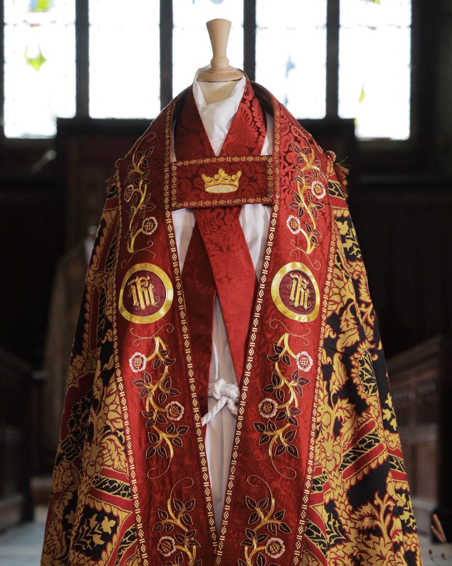 Minster Cope in 'Pine' with Sarum Red 'Holbein' orphreys and Hand - Embroidered Hood & Orphreys - Watts & Co.